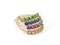 Lot 1036 - A gold four row hareme ring