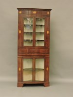 Lot 1508 - An early 19th century mahogany bow front free standing glazed corner cupboard