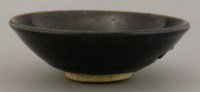 Lot 1152 - A black-glazed tea bowl