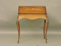 Lot 1499 - An inlaid rosewood bureau du dame