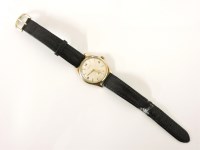 Lot 1013 - A 9ct gold gentleman's Garrard presentation mechanical strap watch