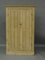 Lot 1510 - A large pine cupboard