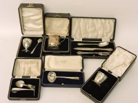 Lot 1082 - A collection of silver christening sets