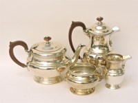 Lot 1129 - A silver four piece tea service
