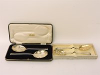 Lot 1133 - A pair of silver serving spoons