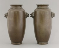 Lot 1215 - A pair of Shisou bronze vases