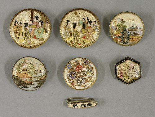Lot 540 - A pair of 'Satsuma' buttons