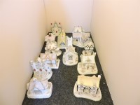 Lot 1359 - Fourteen assorted Coalport fine bone china houses