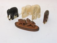Lot 1101 - Two late 19th century carved ivory elephants