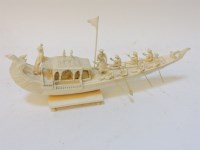 Lot 1145 - A late 19th century ornately carved Indian ivory boat