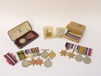 Lot 1089 - A George VI Imperial Service medal