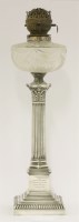 Lot 135 - A silver oil lamp