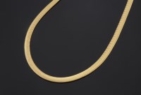 Lot 501 - A 9ct gold rolled Brazilian snake necklace