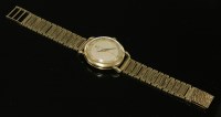 Lot 610 - A gentlemen's 9ct gold Omega Automatic strap watch