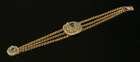 Lot 322 - A Regency three-colour gold emerald bracelet