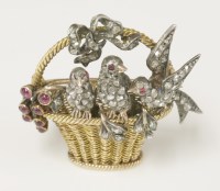 Lot 370 - A diamond and ruby set 'birds in a basket' brooch