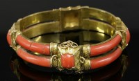 Lot 405 - A Victorian two-row coral set gold bracelet