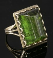 Lot 489 - A single stone green tourmaline ring