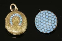 Lot 407 - A Victorian oval gold hinged locket