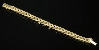 Lot 436 - A late Victorian gold hollow curb link bracelet