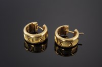 Lot 584 - A pair of gold Tiffany 'Atlas' hoop earrings