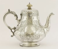 Lot 102 - A Victorian silver teapot