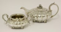 Lot 3 - A 19th century Indian Colonial silver teapot and two-handled sugar bowl