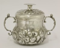 Lot 72 - A Charles II provincial silver two-handled porringer and cover