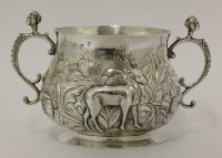 Lot 73 - A Charles II large silver two-handled porringer