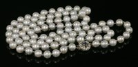 Lot 545 - A single row uniform cultured pearl opera necklace