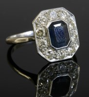 Lot 549 - A sapphire and diamond hexagonal cluster ring