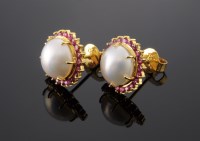 Lot 537 - A pair of 18ct gold mabé pearl and ruby cluster earrings