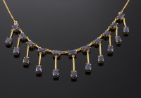 Lot 580 - An 18ct and 14ct gold sapphire fringe necklace