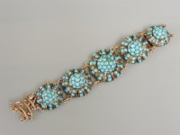 Lot 408 - A silver and gold mounted turquoise bracelet