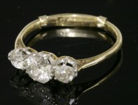 Lot 504 - A three stone diamond ring