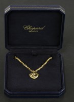 Lot 586 - A Chopard 'Happy Diamonds' heart-shaped pendant