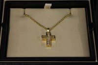 Lot 587 - A Chopard 'Happy Diamonds' cross and chain