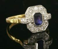 Lot 548 - A sapphire and diamond hexagonal cluster ring