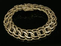 Lot 475 - An 18ct gold two-row entwined curb link chain bracelet