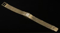 Lot 607 - A ladies' 9ct gold Girard-Perregaux mechanical bracelet watch