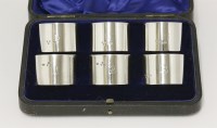 Lot 136 - A set of six silver napkin rings