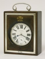 Lot 208 - An Edwardian silver swing-handled mounted leather watch case holder