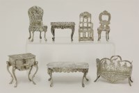 Lot 217 - A collection of seven silver miniatures