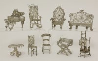 Lot 230 - A collection of nine silver filigree miniatures