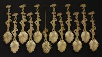 Lot 113 - An unusual set of ten silver gilt harlequin teaspoons with a mote spoon en suite