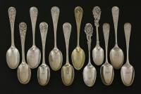 Lot 121 - A collection of twelve 18th century silver fancy-back teaspoons