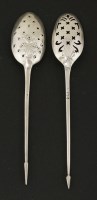 Lot 131 - An 18th century silver picture-back mote spoon