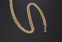 Lot 590 - A Victorian gold guard chain