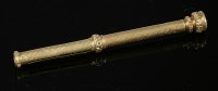 Lot 601 - A gold slide action propelling pencil