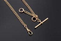 Lot 600 - A 15ct gold curb link double albert chain